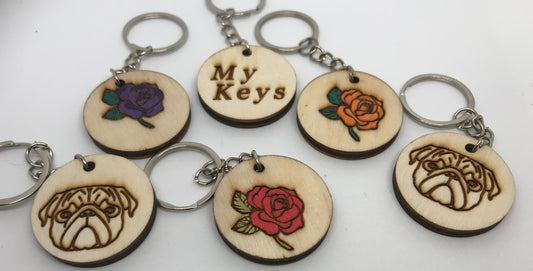 Personalised wooden key rings.