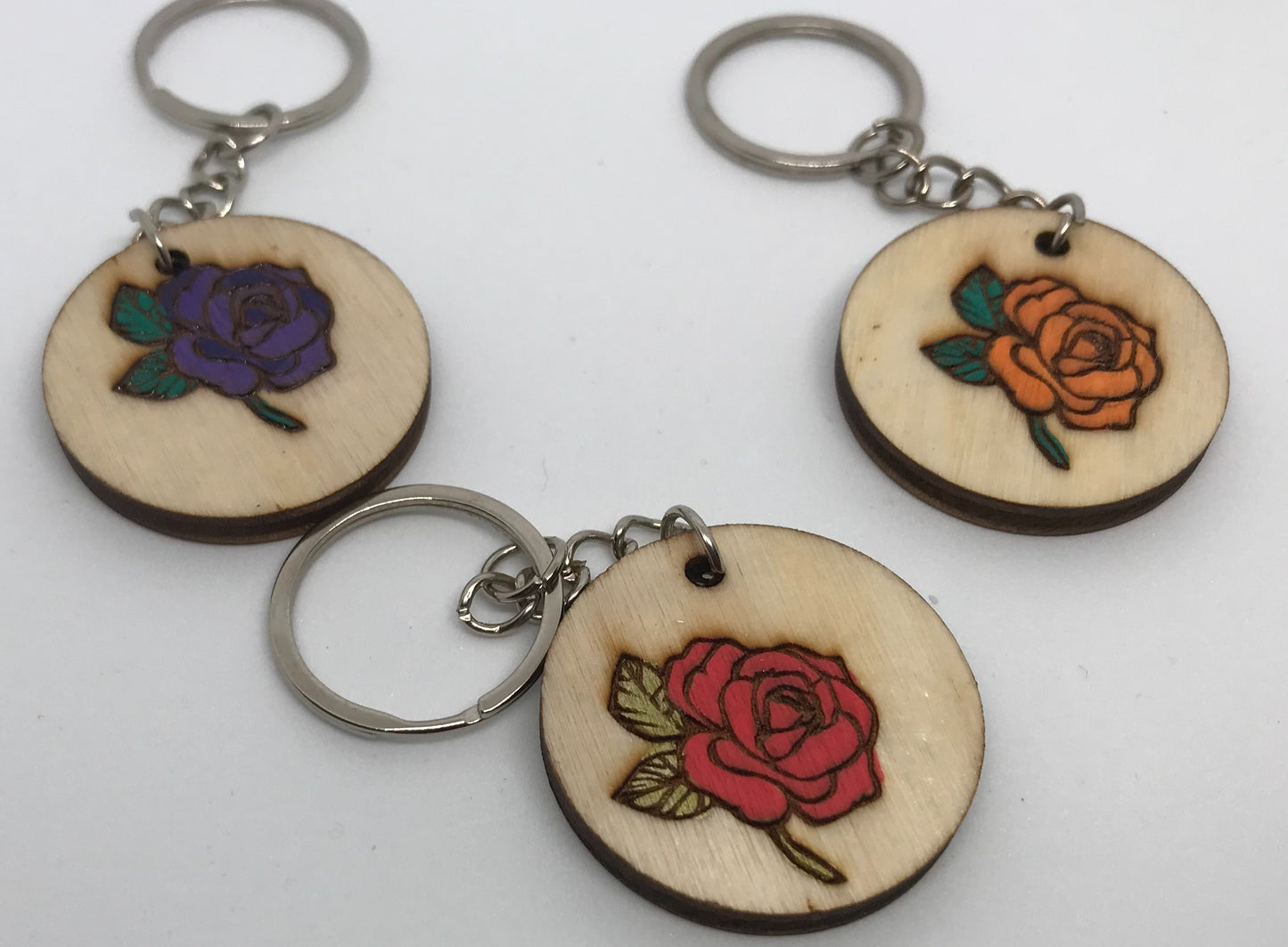 Personalised wooden key rings.