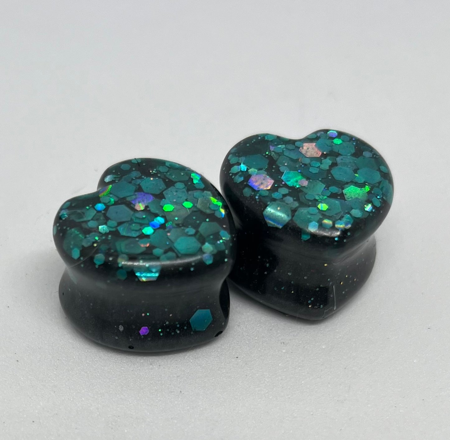Resin ear gauges, green glitter ear plugs, heart ear gauges, green heart gauges, glitter heart gauges, green glitter hearts,