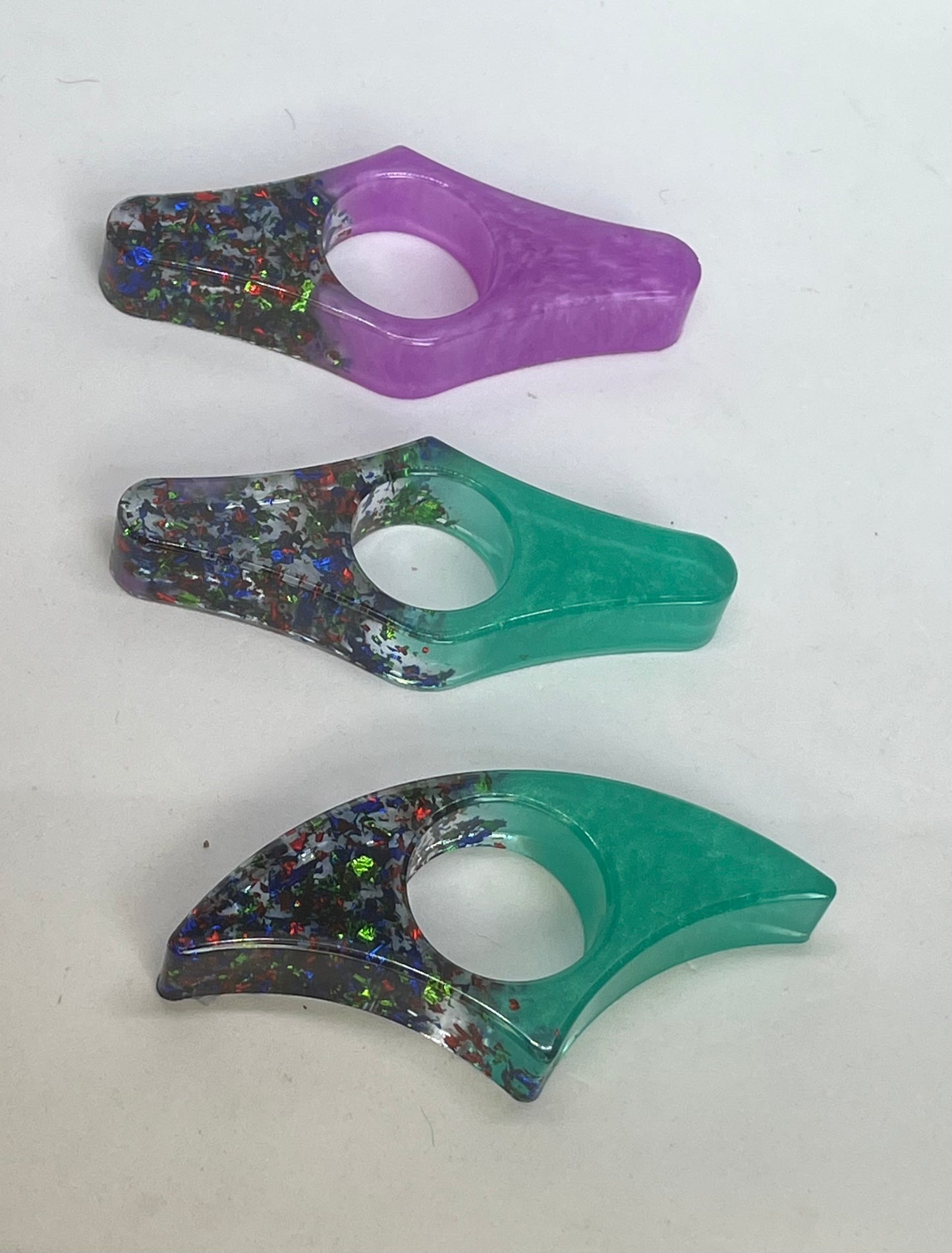 Resin page holders for books