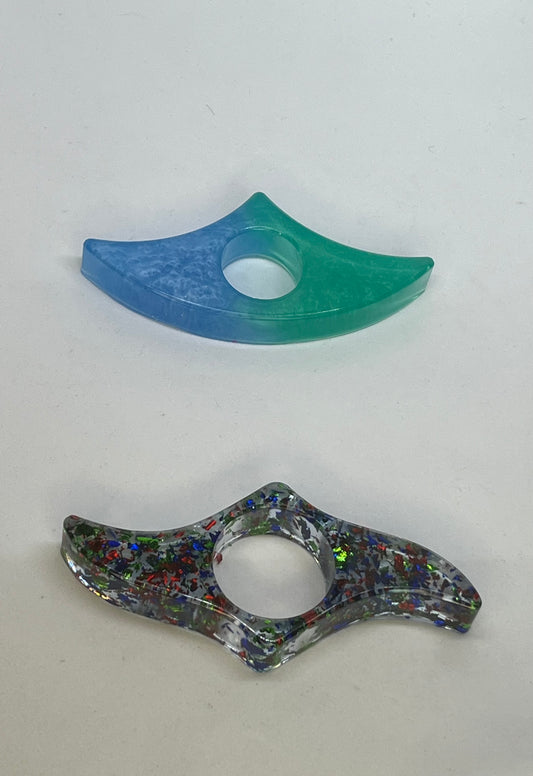 Resin page holders for books