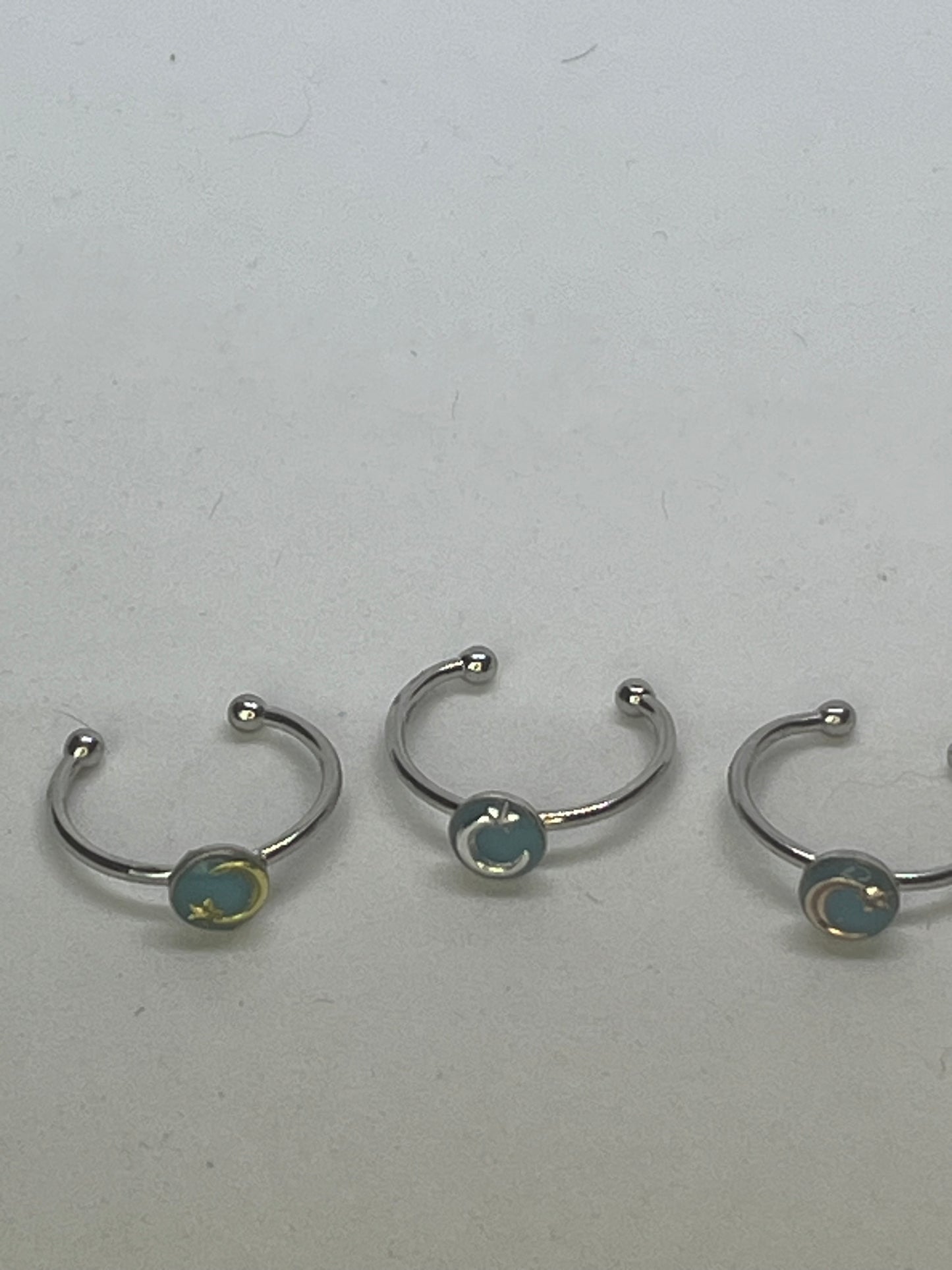 Adjustable shooting star ring