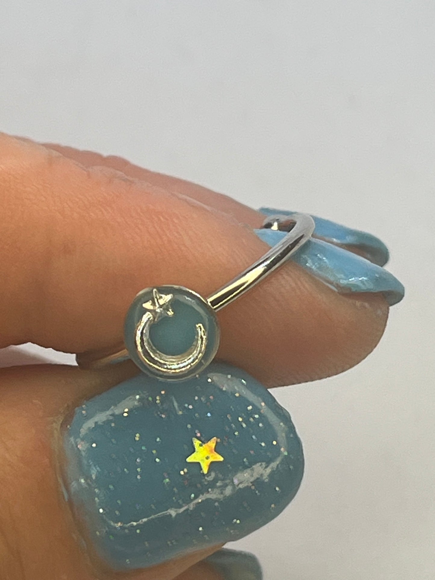 Adjustable shooting star ring