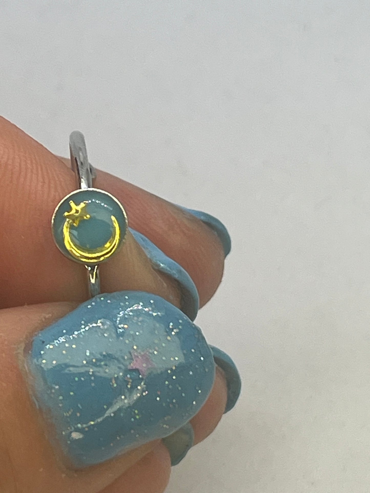 Adjustable shooting star ring