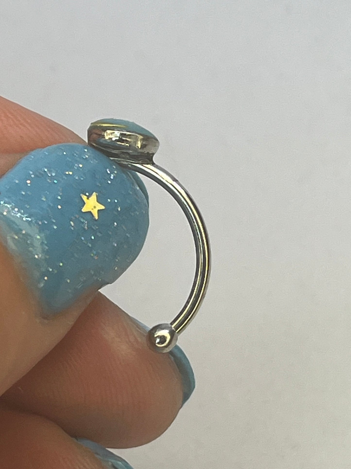 Adjustable shooting star ring
