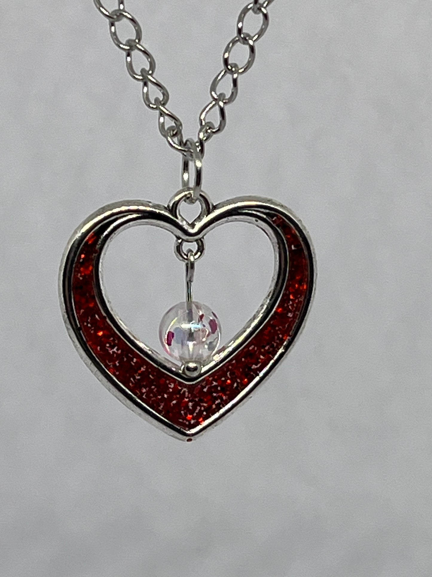 Heart necklace with bead