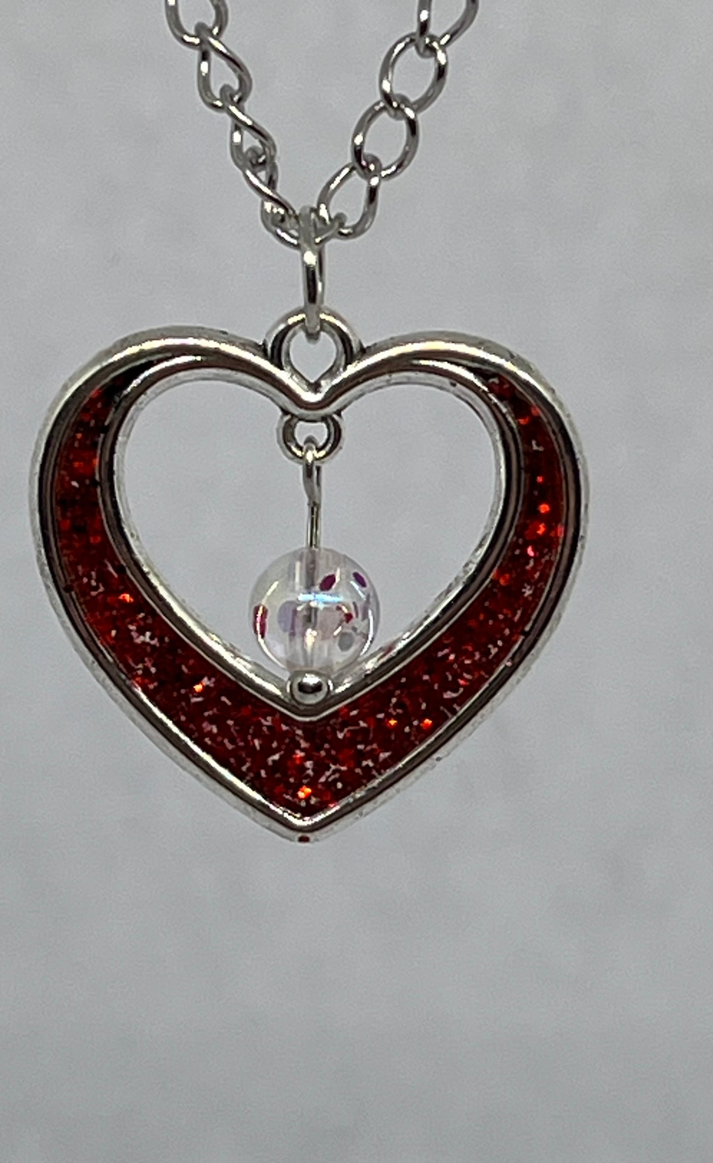 Heart necklace with bead