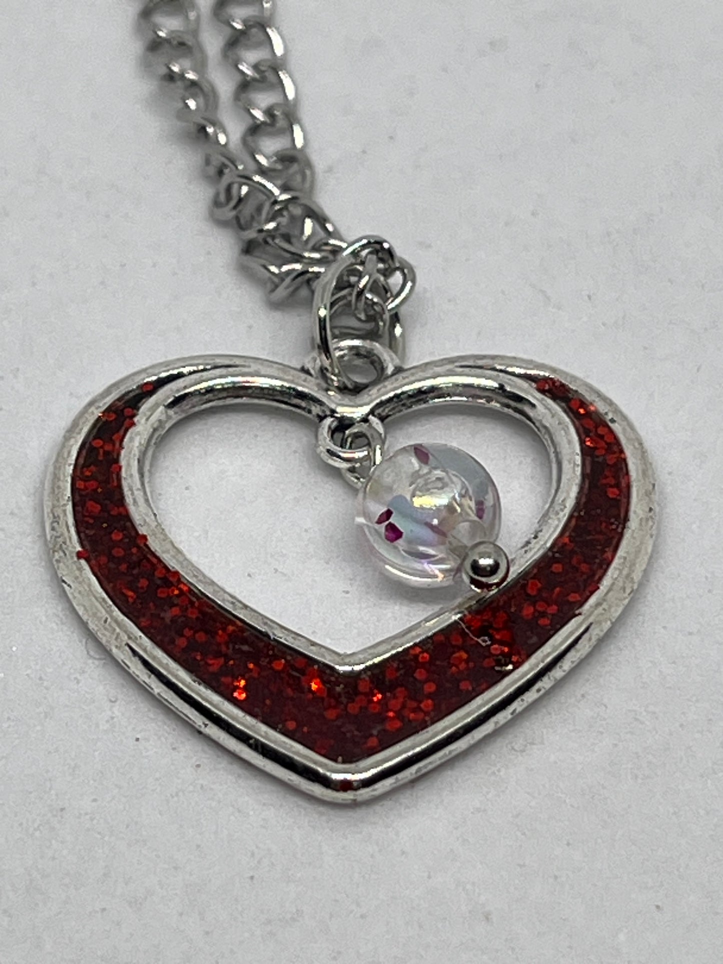 Heart necklace with bead