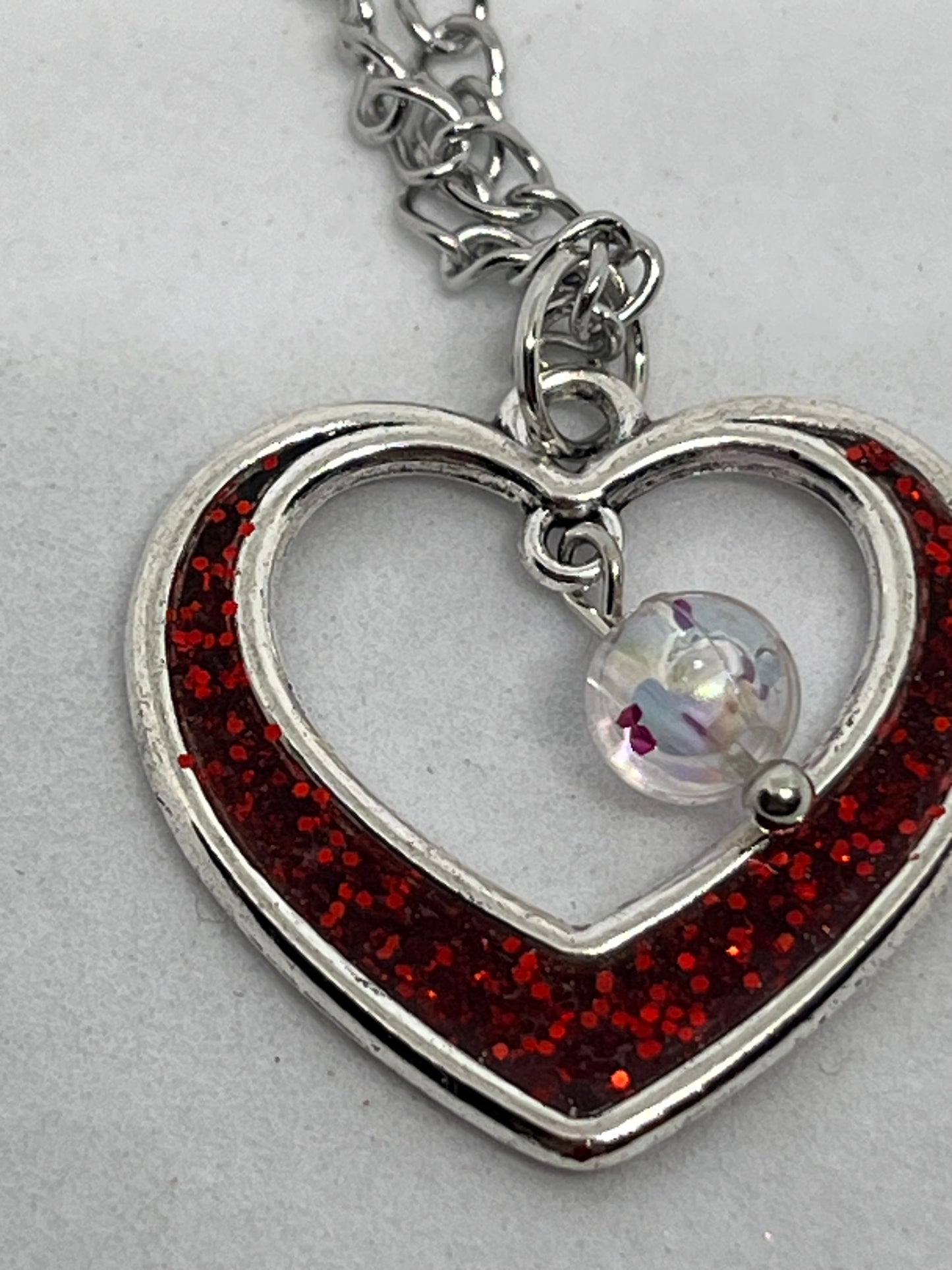 Heart necklace with bead