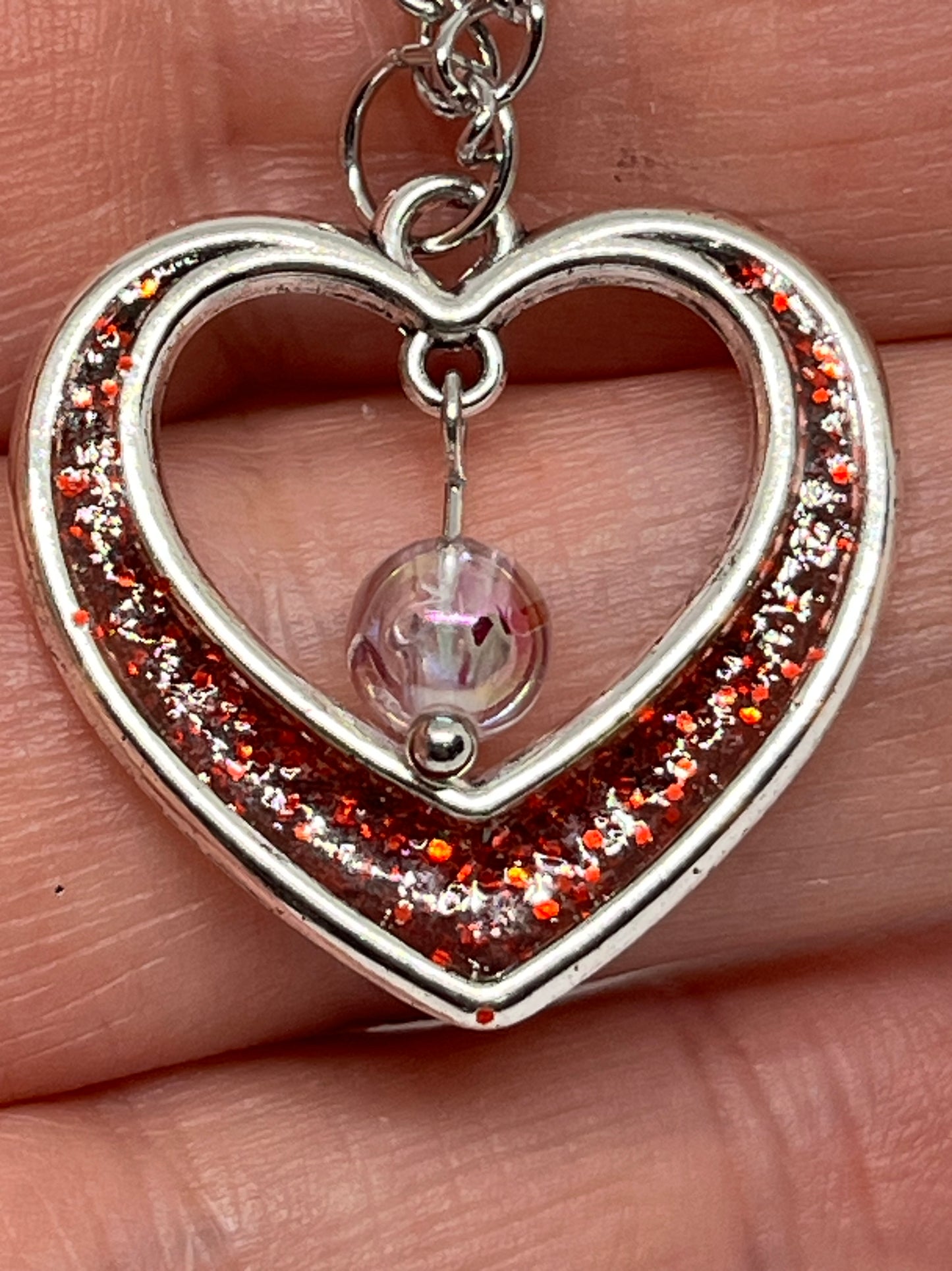Heart necklace with bead