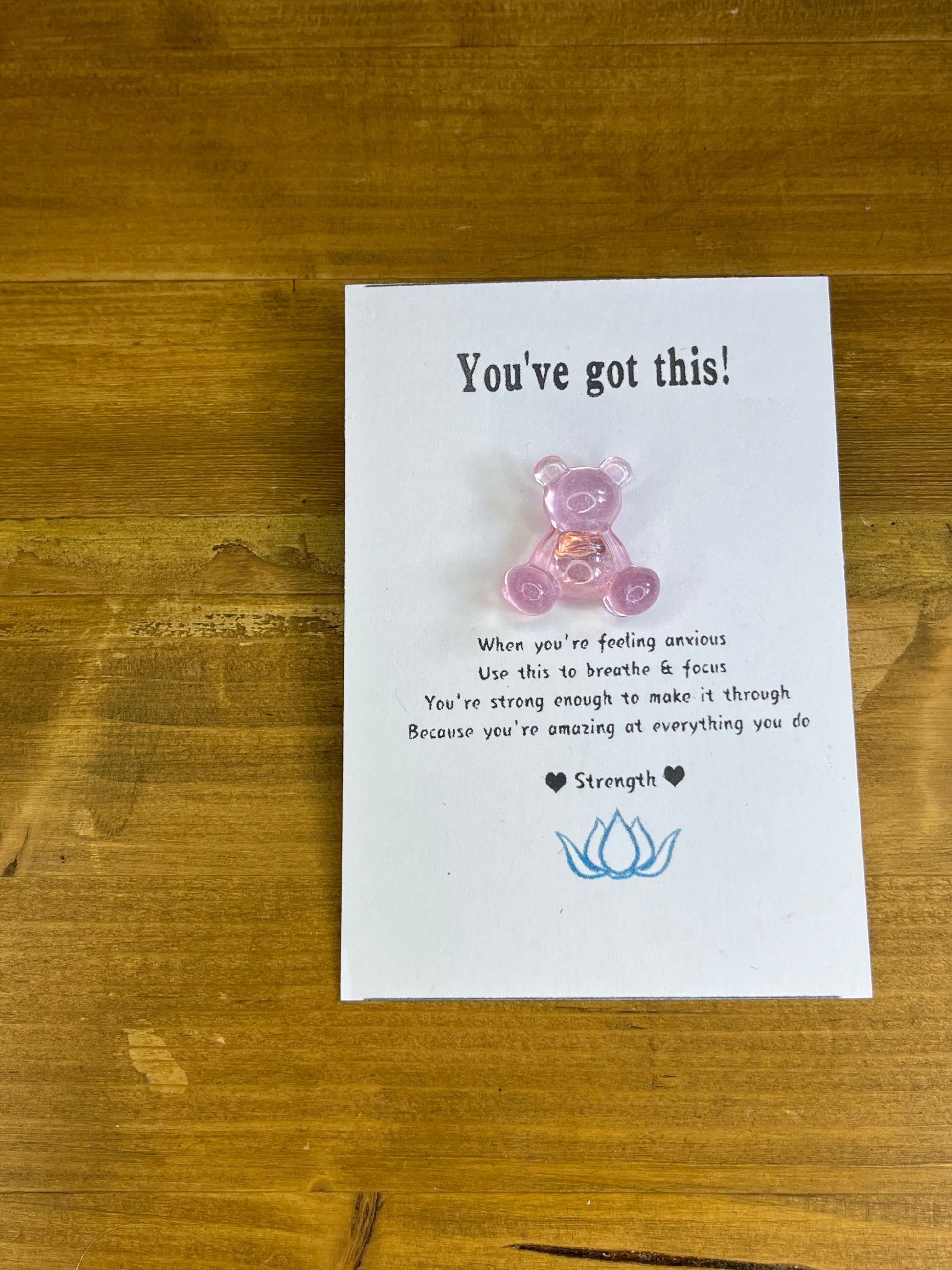 Small pink teddy bear pin badge on cardboard backing, with the phrase " you Got This"
